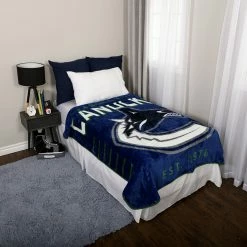 Nemcor NHL Vancouver Canucks Plush Super Soft Blanket, 60" X 70" -KidKraft store 04DB2BB3 3