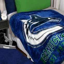 Nemcor NHL Vancouver Canucks Plush Super Soft Blanket, 40" X 50" 6 Nemcor NHL Vancouver Canucks Plush Super Soft Blanket, 40" X 50" -KidKraft store 34755A86 2