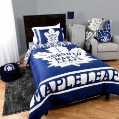 NHL Toronto Maple Leafs 4 Piece Twin Bedding Set With Reversible Comforter, Fitted Sheet, Flat Sheet And Pillowcase By Nemcor