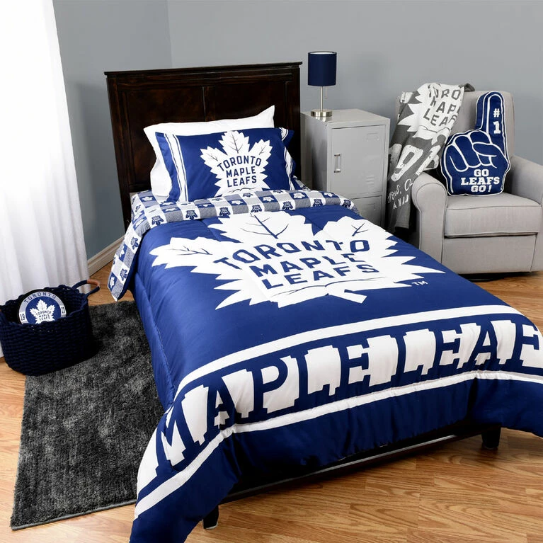 NHL Toronto Maple Leafs 4 Piece Twin Bedding Set With Reversible Comforter, Fitted Sheet, Flat Sheet And Pillowcase By Nemcor 3 NHL Toronto Maple Leafs 4 Piece Twin Bedding Set With Reversible Comforter, Fitted Sheet, Flat Sheet And Pillowcase By Nemcor